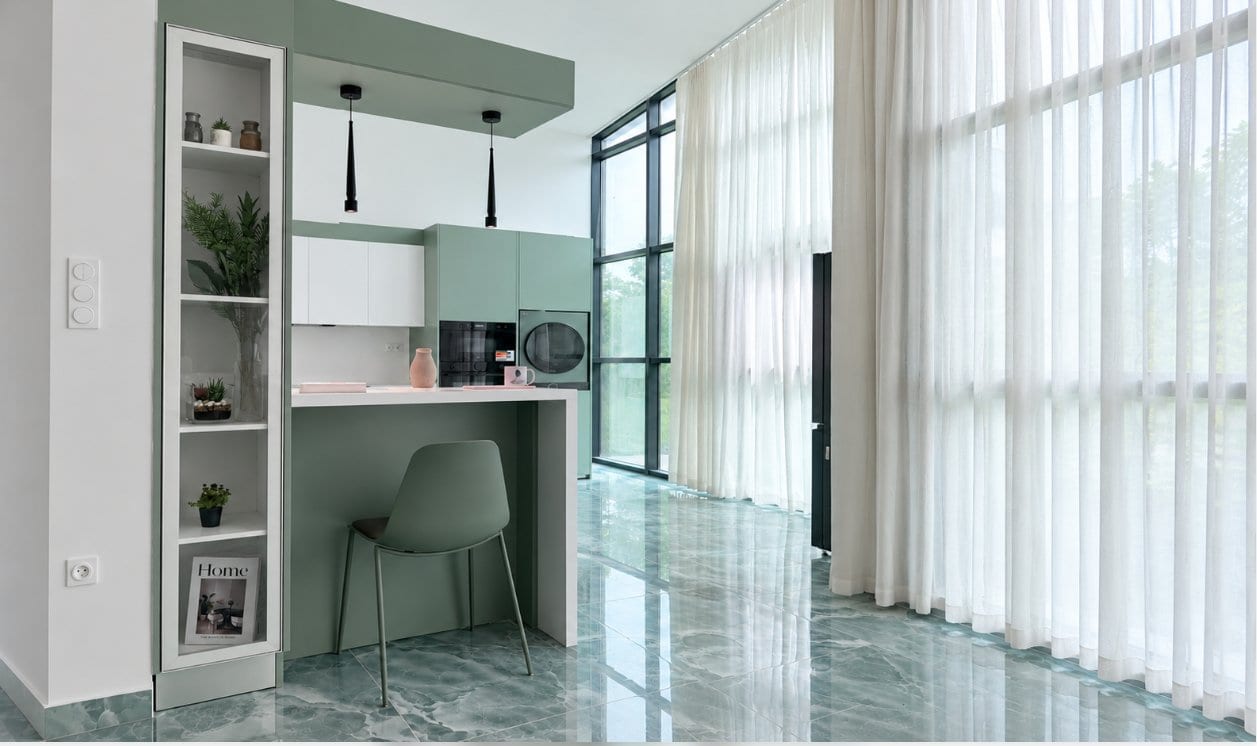 Un espace cuisine moderne et lumineux, pensé pour allier élégance, fonctionnalité et confort au quotidien.